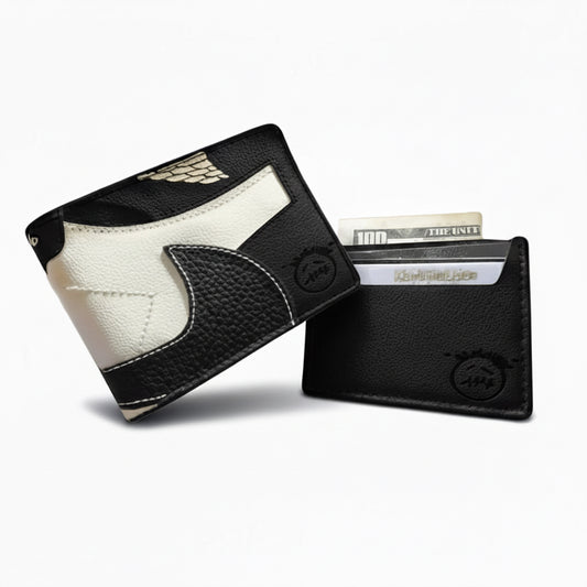Two black and white leather wallets on a light gray background